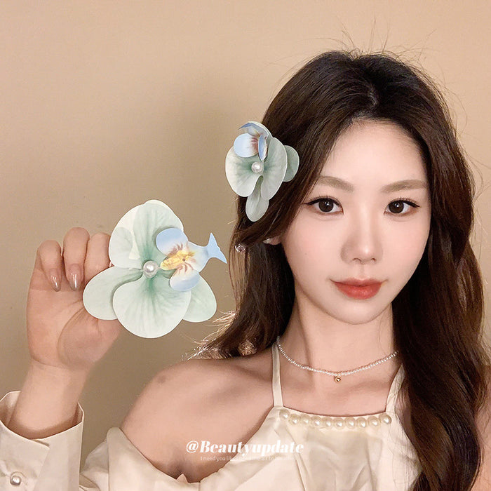 Pale Green And Blue Orchid Hair Clip With Pearl Like Center