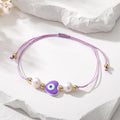 Cord and Pearl Accent Heart Evil Eye Bracelets in Nine Colors view 2