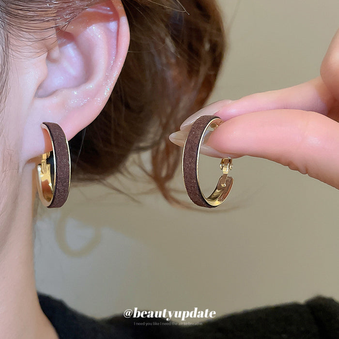 Gold Tone Hoop Earrings With Brown Velvet Wrap With Polished Metal Details
