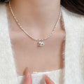 Blue Beaded Rocking Horse Necklace with Distinctive Textured Details view 4