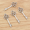 Floral Bow Key Metal Charms in Two Antique Finishes view 2