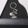 Silver Tone Ship Wheel Globe Anchor and Lifebuoy Keychains view 3