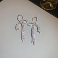 Crystal Bow Hook Earrings in Gold Tone or Silver Tone view 7