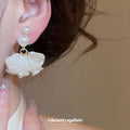 White Petal and Pearl Cluster Clip Earrings for Everyday Styling view 3