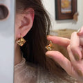 Gold Tone Amber Square Clip Earrings with Faceted Centers view 1