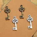 Floral Bow Skeleton Key Charm Metal Jewelry Making Component In 3 Finishes view 1