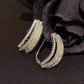 Silver Tone Multi-Row Baguette Curve Hoop Earrings view 3