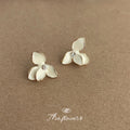 White Three Petal Enamel Crystal Center Stud Earrings Pair view 1