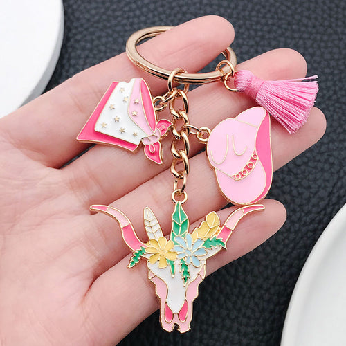Alternate arrangement of the pink western hat floral longhorn metal keychain showing its hardware and charm details