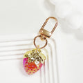 Gold Tone Transparent Strawberry Clip Keychains in Seven Colors view 9