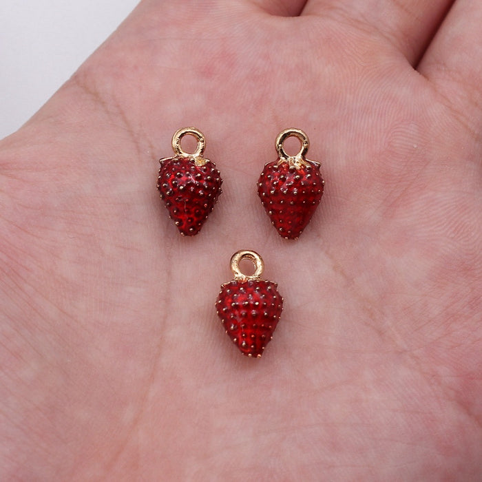 Textured Red Strawberry Charm with Green Enamel Leaf and Gold Tone Loop