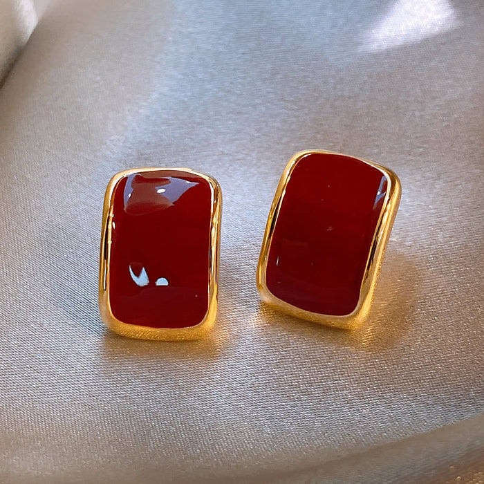 Glossy Red Rectangular Stud Earrings with Gold Tone Frames
