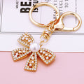 Mixed Letter D Bow and Pearl Mini Bow Keychains in Two Designs view 3