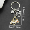 Five-Style Cartoon Dog Paw Bone and Heart Enamel Keychain Collection view 7