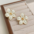 White Enamel Five Petal Flower Stud Earrings Gold Tone view 4