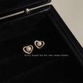 Gold Open Heart Stud Earrings with White Pearl Center view 1