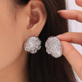Embossed Flower Oval Stud Earrings Gold Or Steel Finish view 3