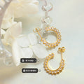 Gold Tone Sunburst C Hoop Earrings With Clear Stones view 2