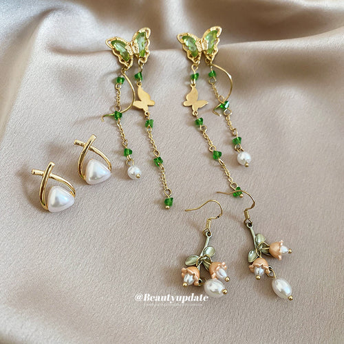 Green butterfly pearl wrap and flower dangle three pair set on silk