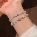 Silver Heart Crystal and Pearl Bow Slider Bracelets view 1