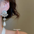 Crystal Floral Pearl Drop Earrings with Distinctive Textured Details view 3