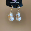 Gold Tone Gourd Pearl Bow Hoop Earrings in Two Colors view 7