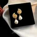 Gold Spiral Shell Stud Baroque White Pearl Drop Earrings view 1