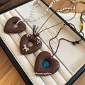 Brown Beaded Heart Necklaces with Blue and White Centers view 1