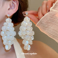 Long White Shell Like Cluster Drop Earrings With Gold Tone Links view 1