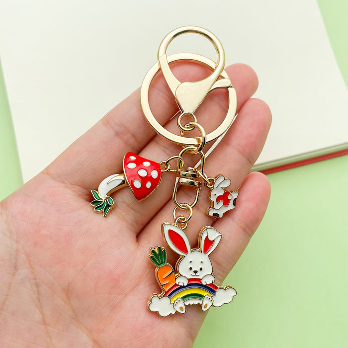 Easter Bunny Charm Keychains Featuring Pink Blossom Across 19 Pictured Variations