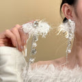 Silver Tone Feather Crystal Chain Statement Earrings view 1