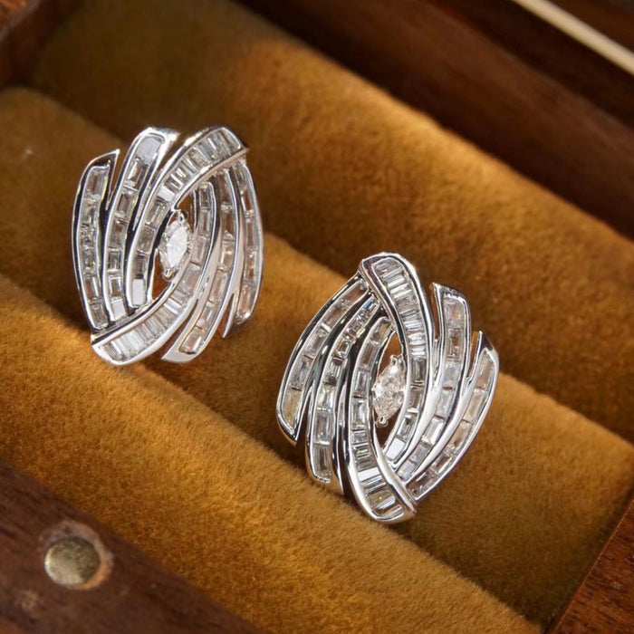 White Metal Swirl Baguette Stud Earrings Marquise Center