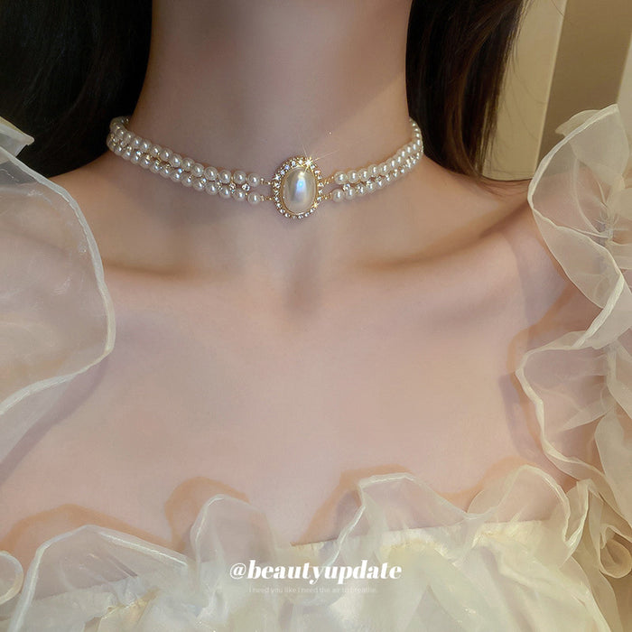 Double Strand Pearl Choker Oval Pearl Crystal Halo Center
