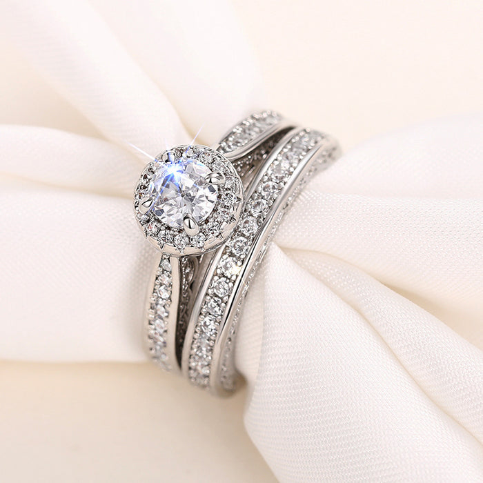 Round Halo Solitaire Two-Ring Set In Polished Silver Tone