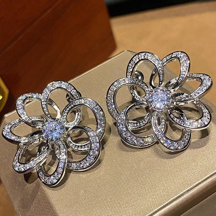 Silver-Tone Open Flower Stud Earrings with Clear Stone Details