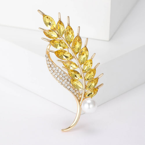 Crystal Wheat Stalk Brooch With White Pearl Accent displayed at an angled product view