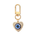 Twelve Piece Gold Tone Crystal Hamsa Heart and Evil Eye Keychain Set view 3