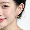 Gold-Tone Baguette CZ Pave Bow Stud Earrings Matching Pair view 2