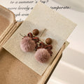 Bow and Faux Fur Pom Pom Stud Earrings in Dusty Brown and Red view 6