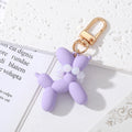 Gold Tone Balloon Dog Clip Keychains with Pearl Collars in Eight Colors view 9