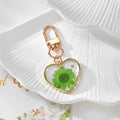 Gold Tone Pressed Flower Daisy Heart Snap-Hook Keychains in Ten Options view 7