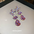 Purple Crystal Floral Teardrop Earrings With Polished Metal Tone Details view 3