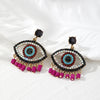 Magenta Tassel Eye