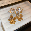 Sculpted Metal Flower Stud Earrings For Women Jewelry view 3