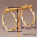 Gold Textured Hammered Twisted Round Hoop Clip Earrings Pair view 4