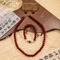 Red Bead Necklace Bracelet and Earring Three Piece Set view 1