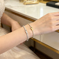 Two Millimeter Gold And Steel Tone Tennis Chain Necklaces And Bracelets view 3
