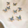 Gold Tone Blue Enamel Butterfly Earrings In Stud And Clip Styles view 1