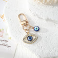 Gold Tone Blue Evil Eye Clip Charms in Eleven Designs view 8