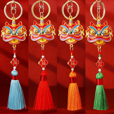 Main image 1 shows a supplied presentation of enamel lion dance head tassel keychains with visible attached key hardware